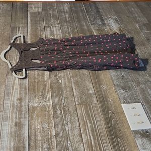 Skater style gray dress with pink poka dots, lace detail and pockets